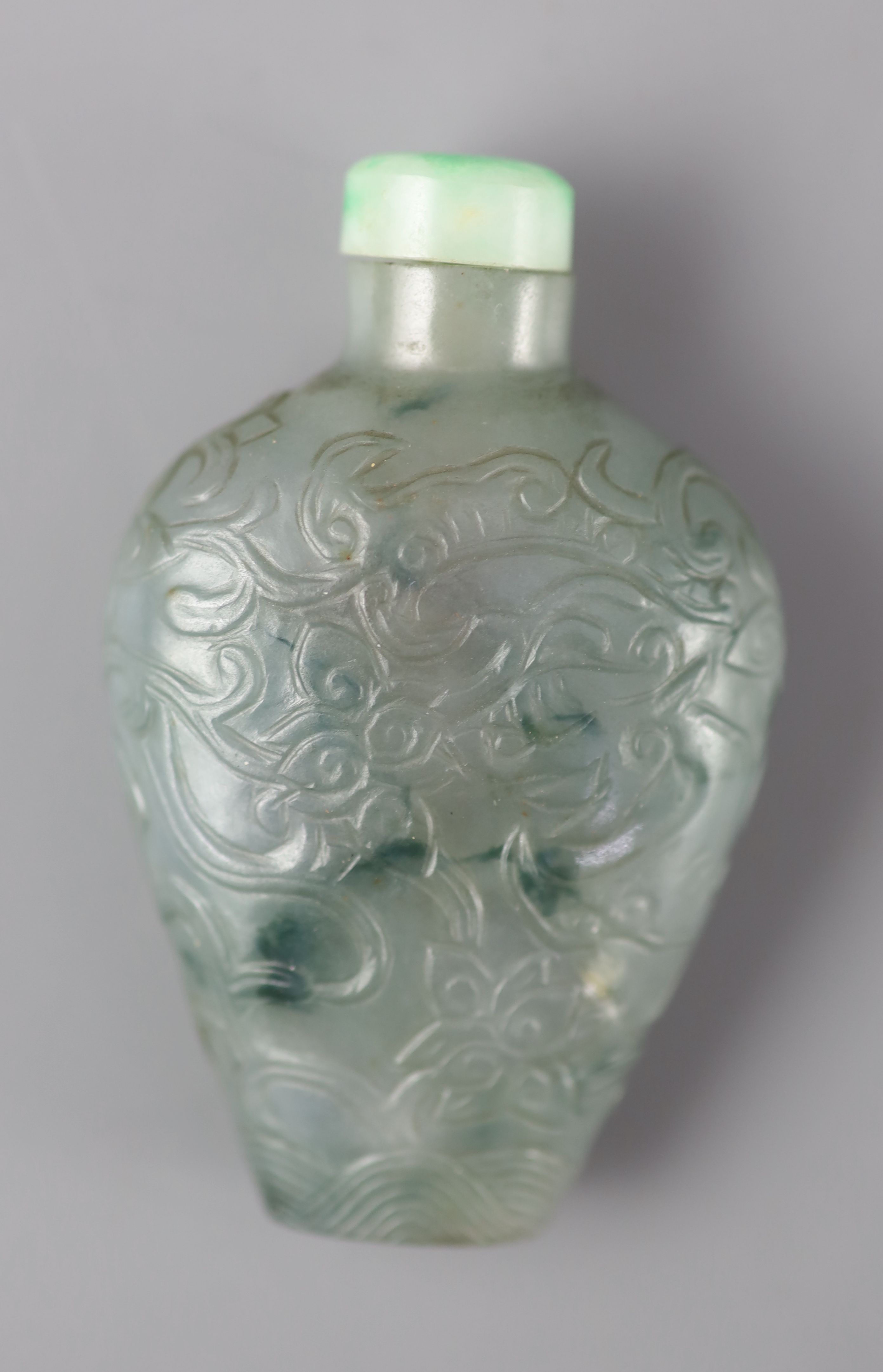 A Chinese blue-green jadeite snuff bottle, 1800-1900, 7.7cm including jadeite stopper,